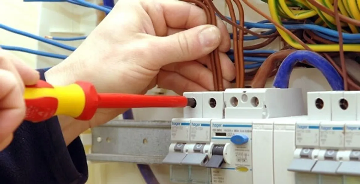 electrician services performing professional electrical panel wiring and connections in Sarasota, FL