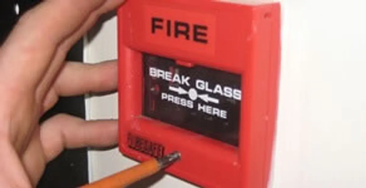 fire alarm installation service showing manual fire alarm pull station installed by licensed electricians in Sarasota, FL